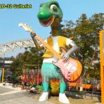 Cartoon Stegosaurus Guitarist Statue