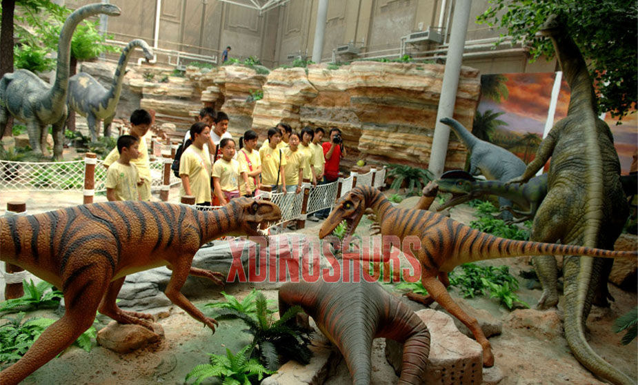 Tourists See Animatronic Dinosaurs