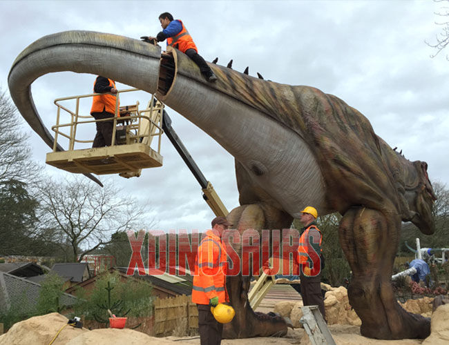 Install Large Animatronic Dinosaur