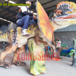 Dilophosaurus Riding Car